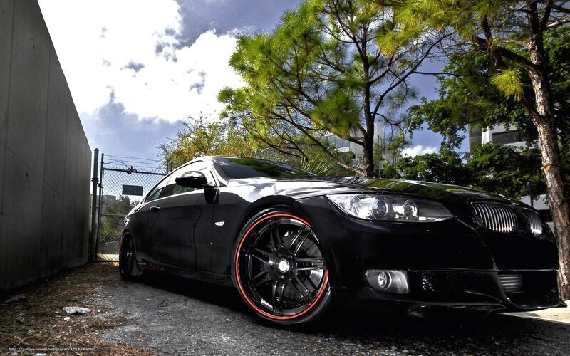 black bmw with red rims