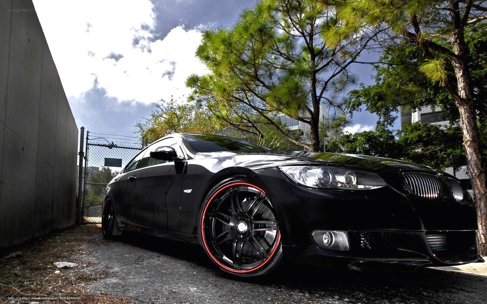 black bmw with red rims