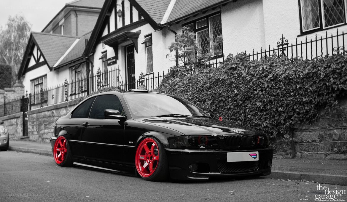 black bmw with red wheels