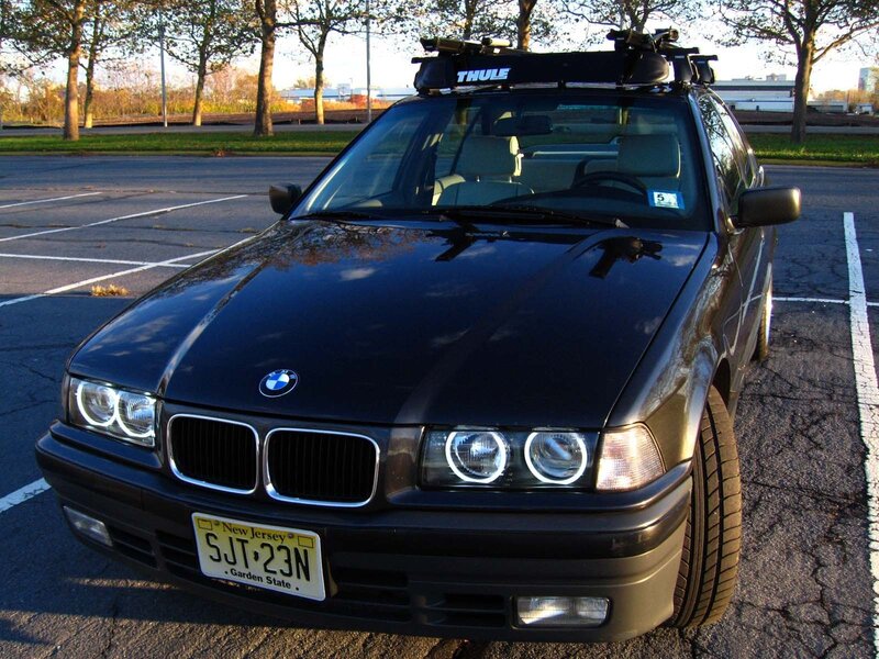 Black BMW with roof rack
