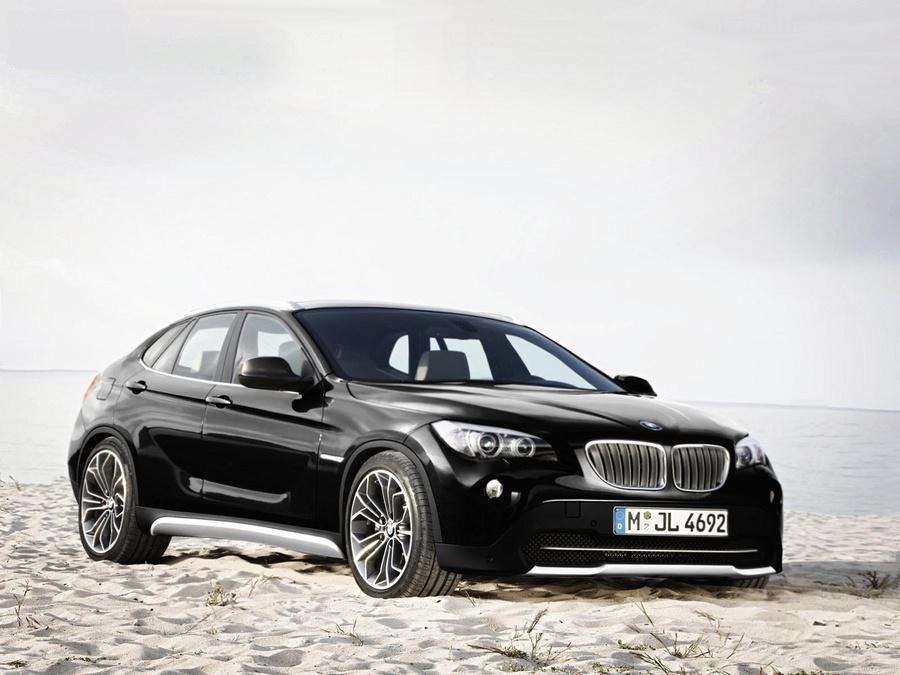 Black BMW X1 on a sandy beach