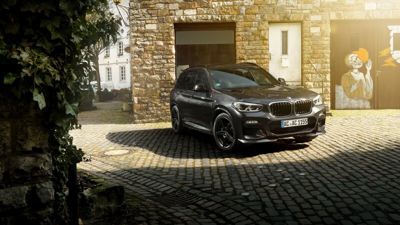 Black BMW X3 SUV — Dramatic