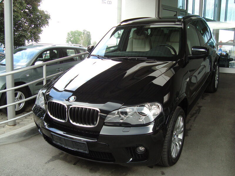 Black BMW X5 parked outside