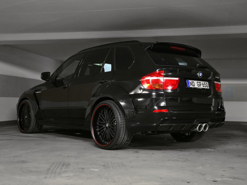 black bmw x5 suv in garage