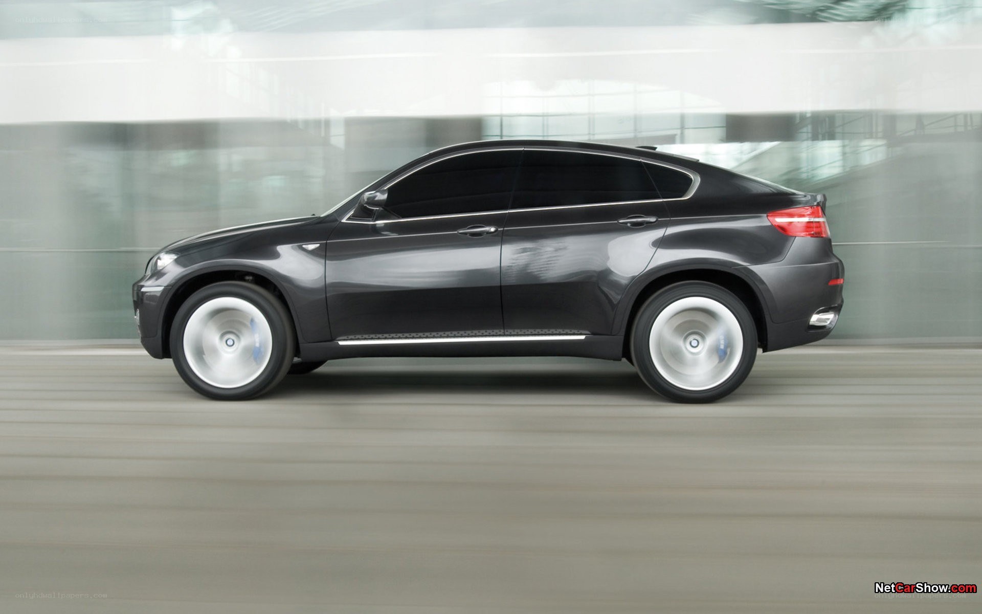 black bmw x6 in motion