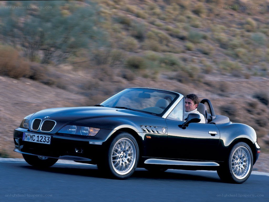 Black BMW Z3 convertible driving