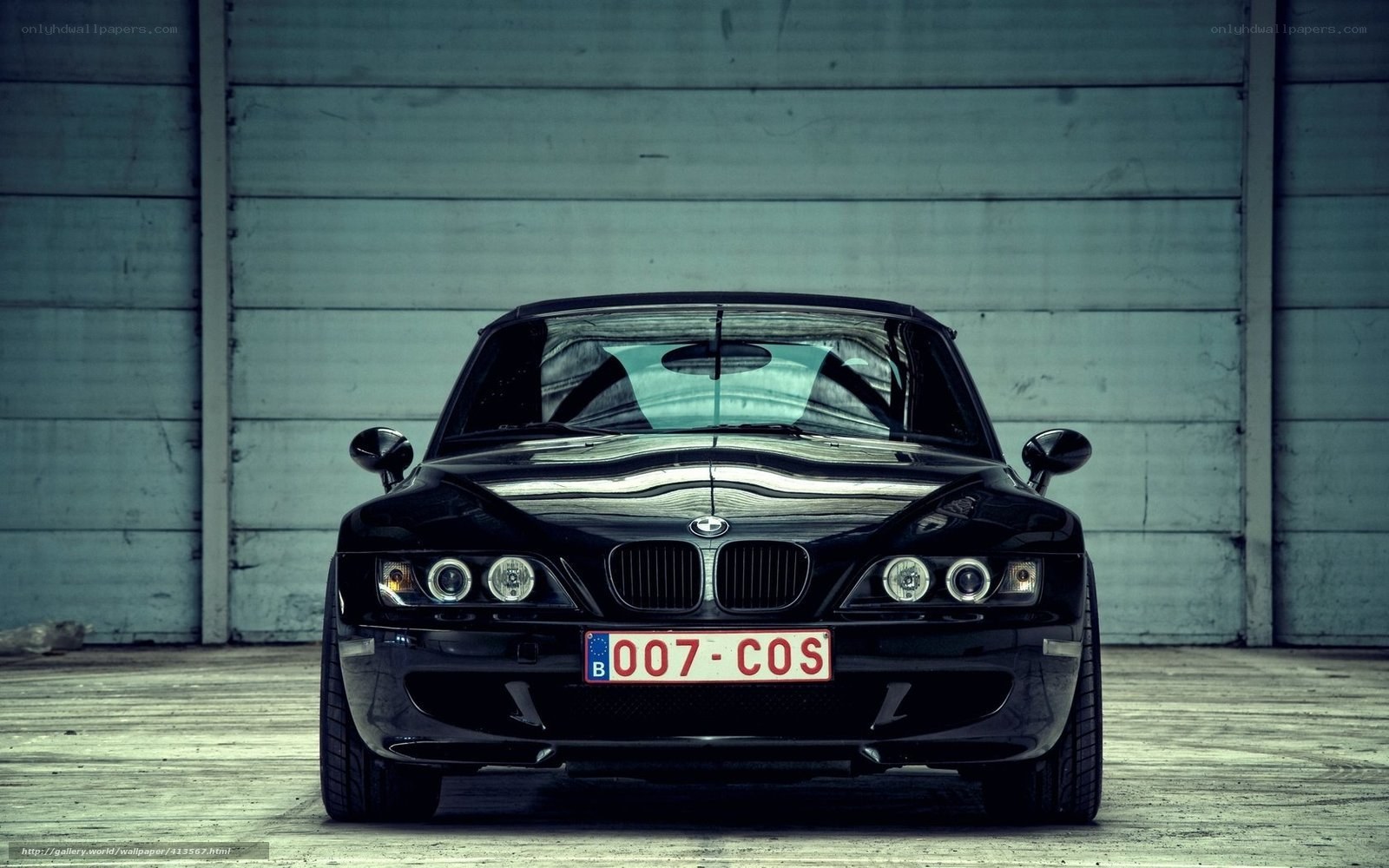Black BMW Z3 parked in garage
