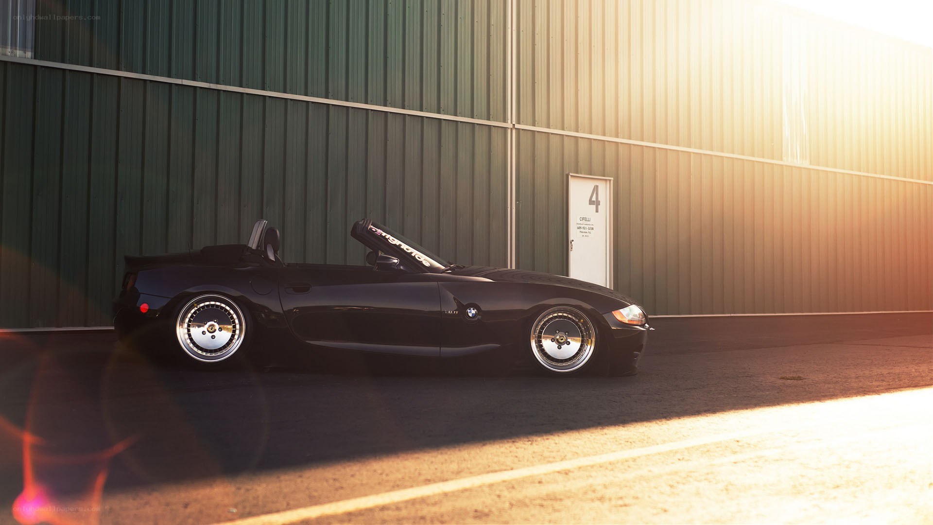 Black BMW Z4 at sunset