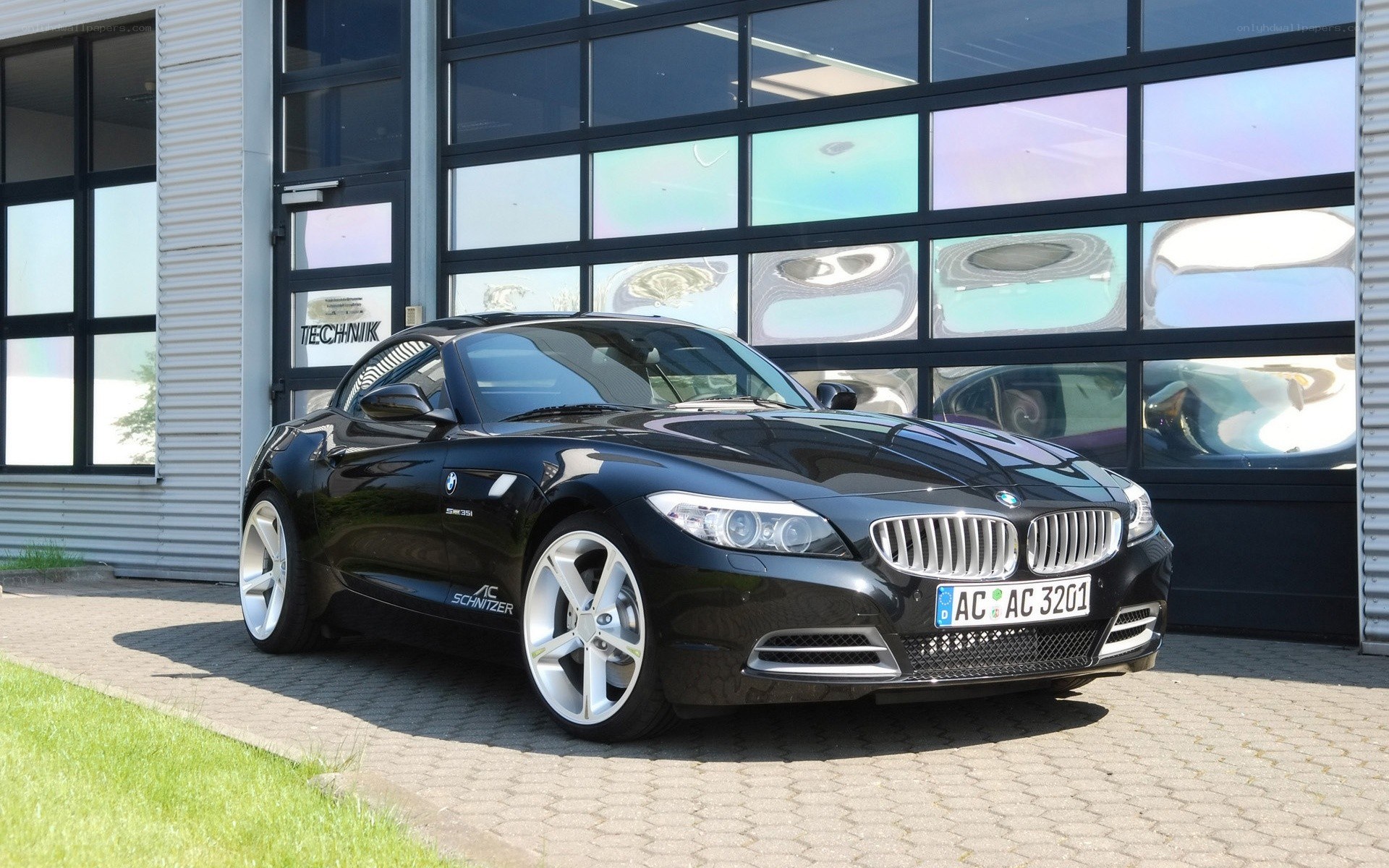 Black BMW Z4 parked outside a building