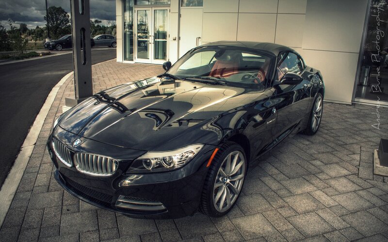 Black BMW Z4 parked outside dealership