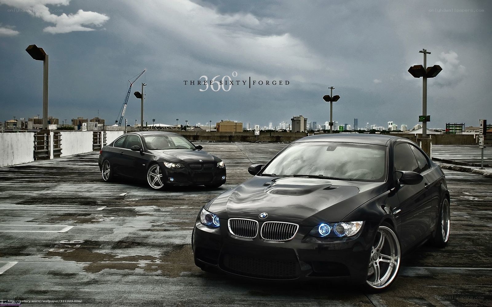 Black BMWs on a rooftop