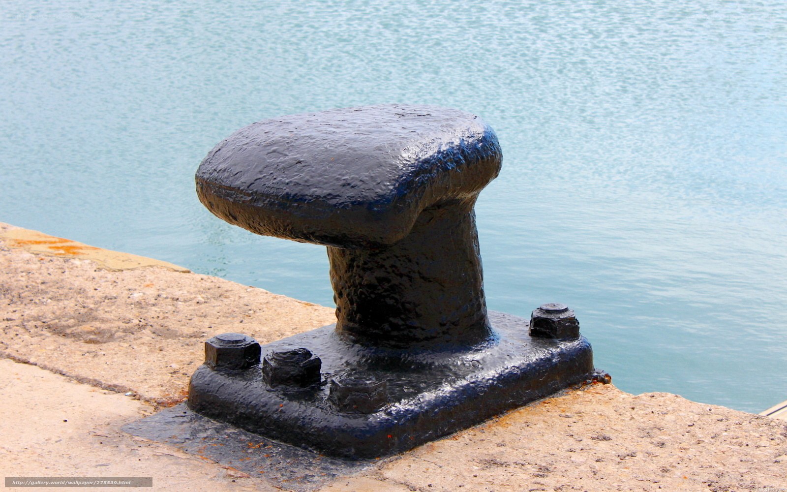 Black bollard on a pier