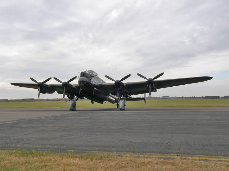 Black Bomber Aircraft — Gray, Overcast
