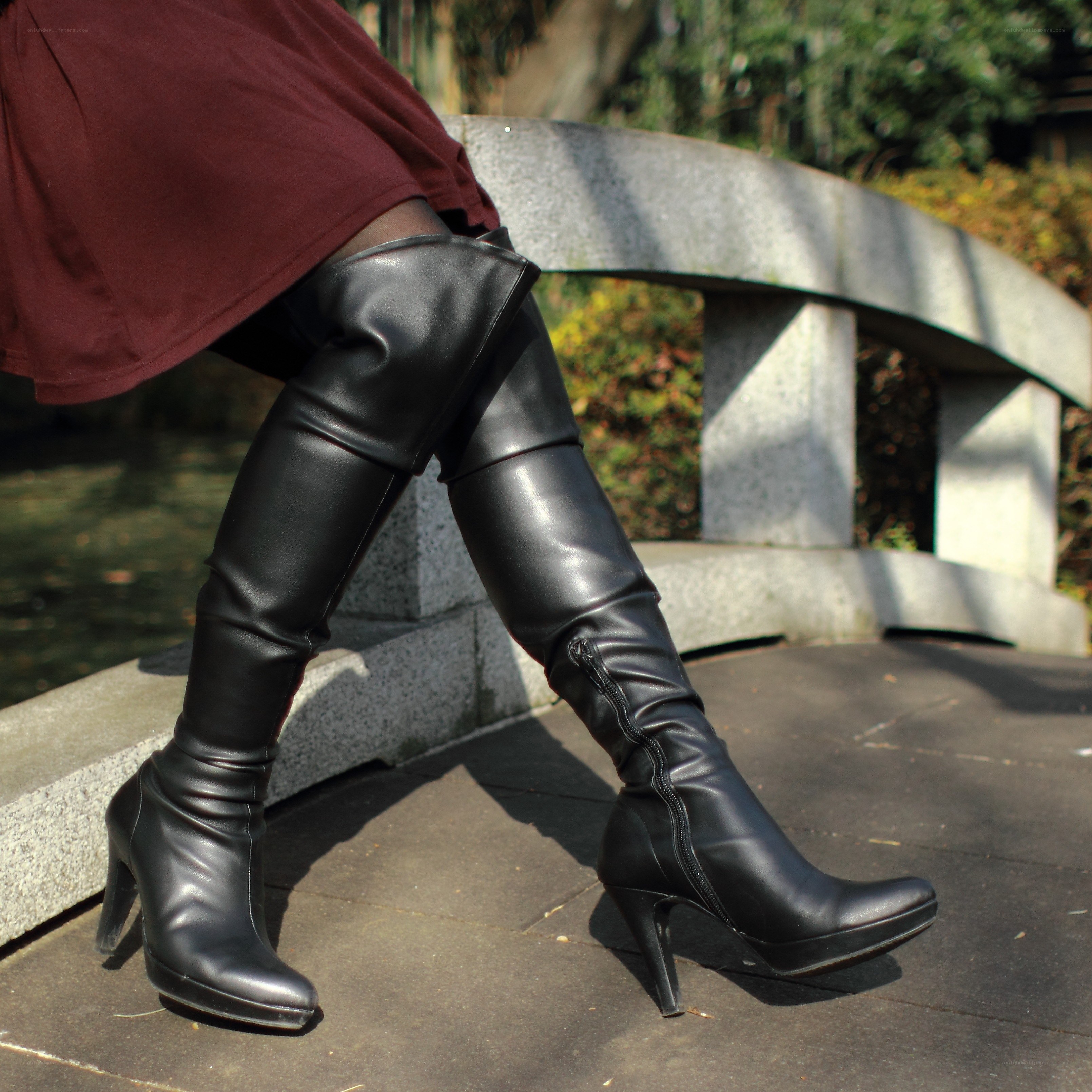 black boots on a bridge