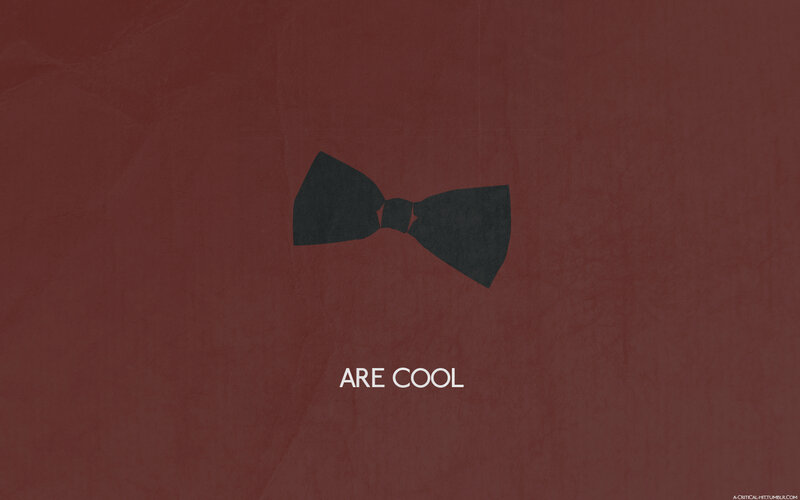 black bow tie on red background