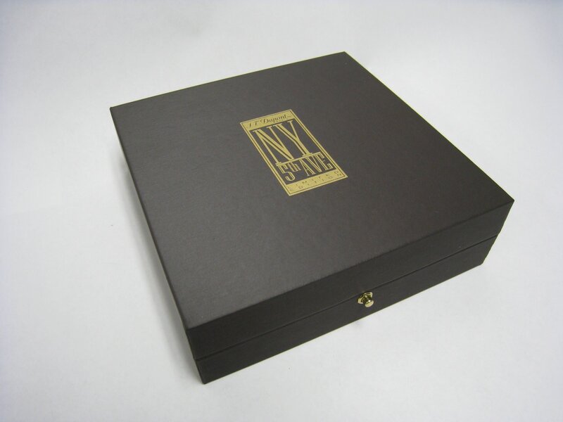 Black Box with Gold Logo — Neutral, Photograph