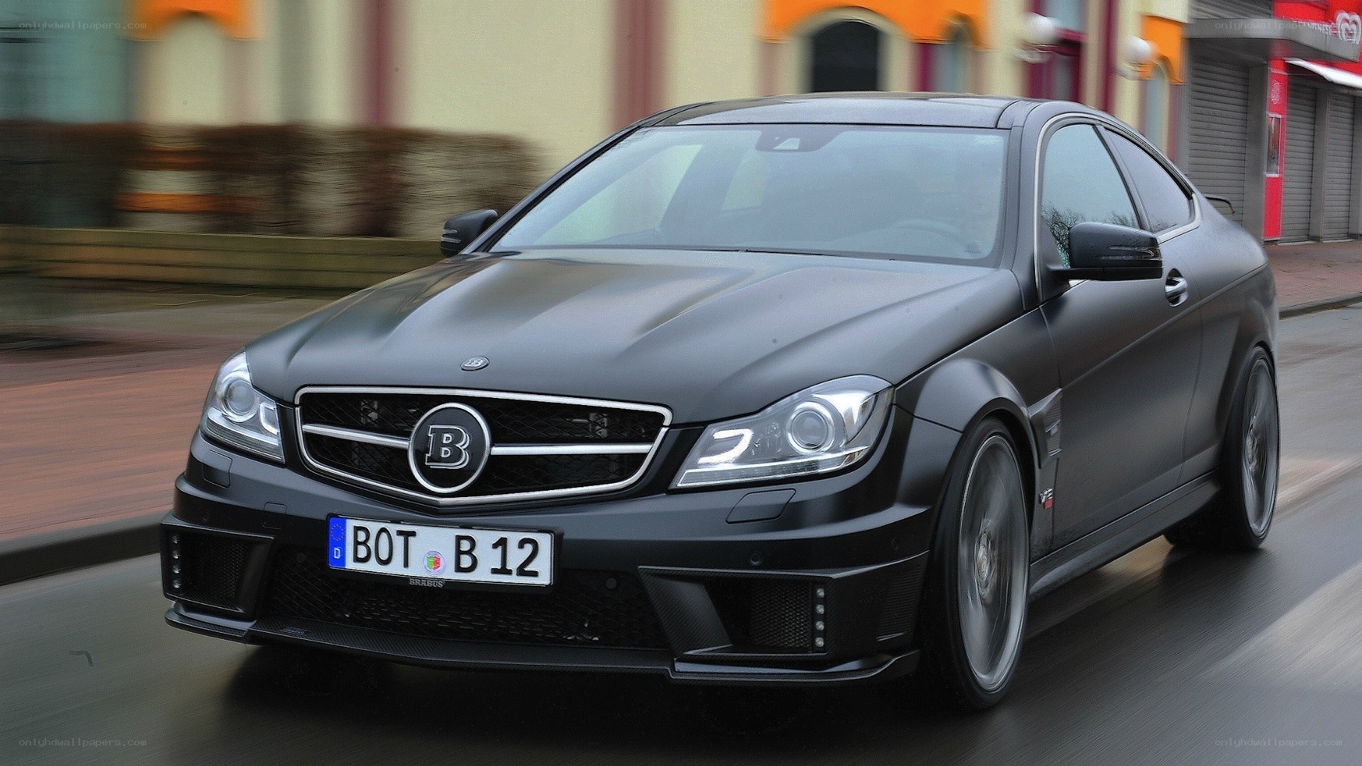 Black Brabus C63 on city street