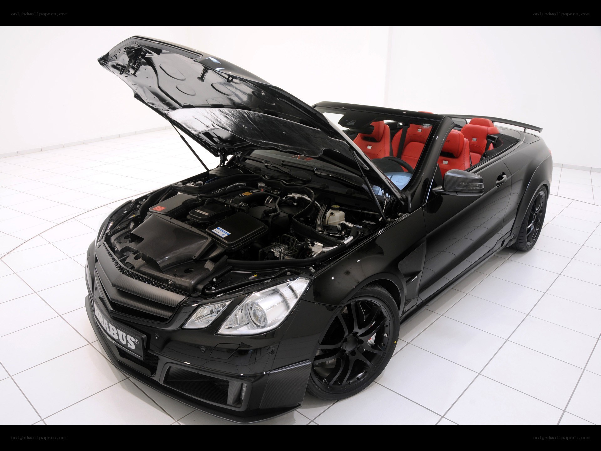 Black Brabus convertible with open hood