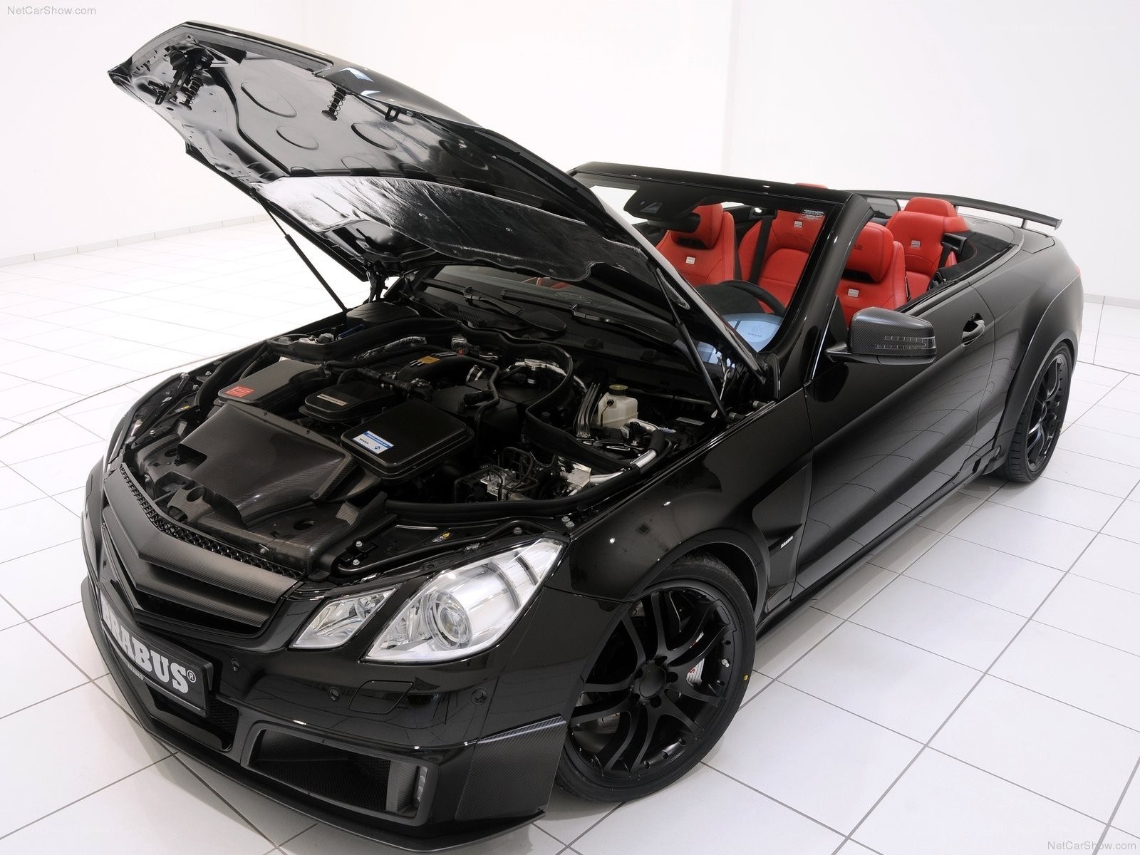 Black Brabus convertible with open hood