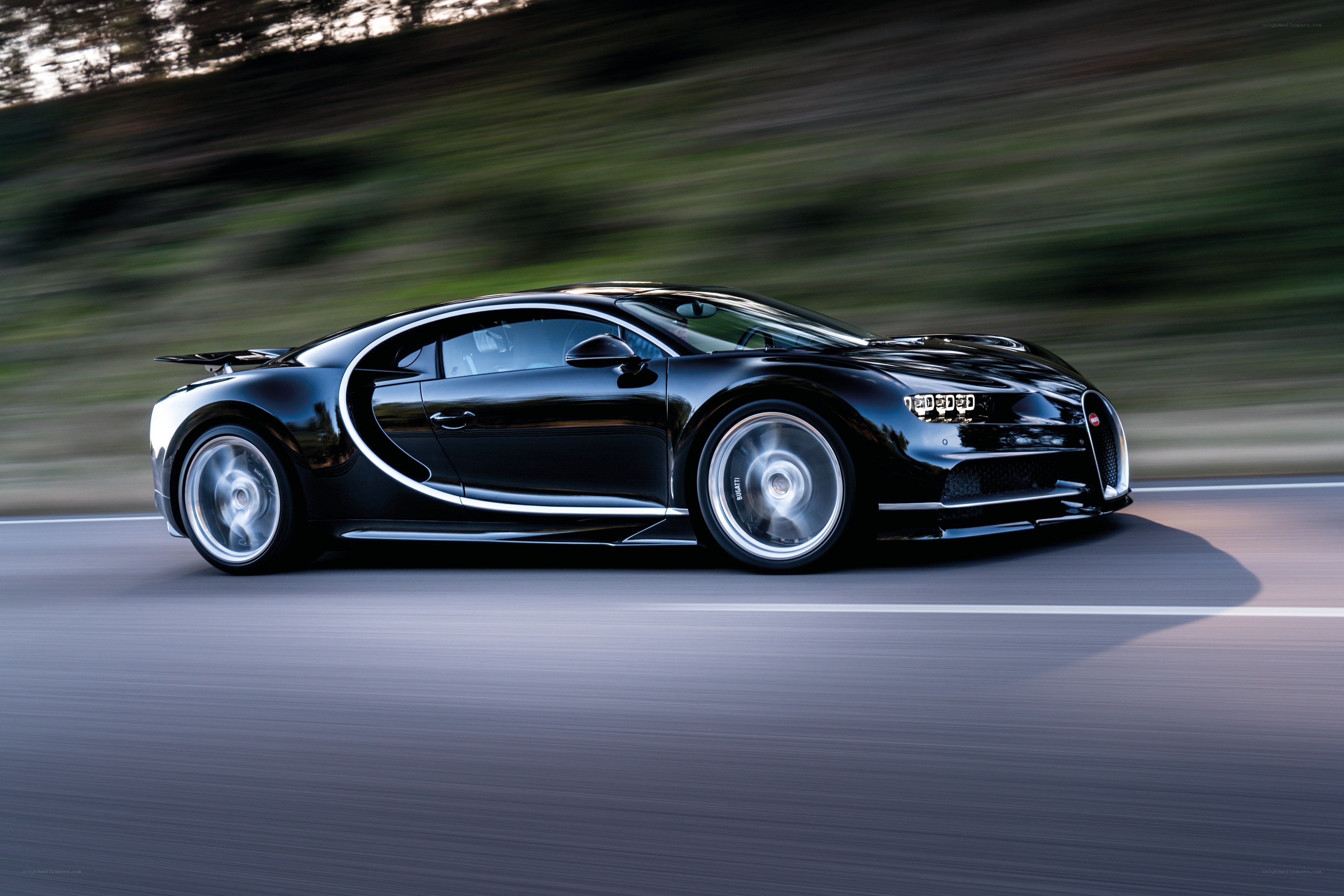 Black Bugatti Chiron in motion