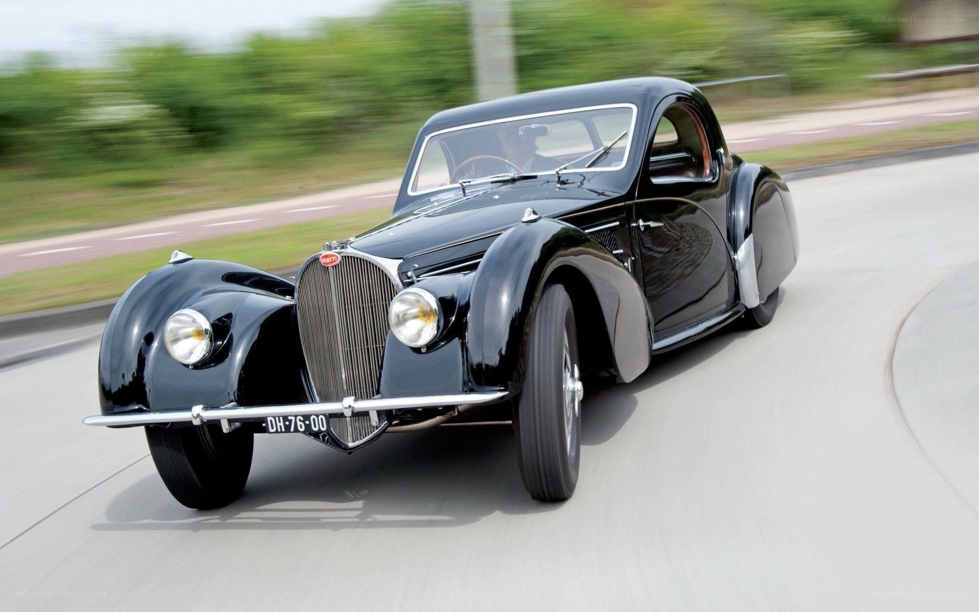 Black Bugatti in motion