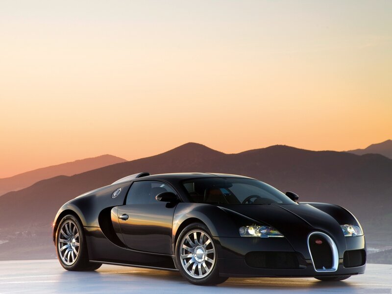 Black Bugatti Veyron at sunset
