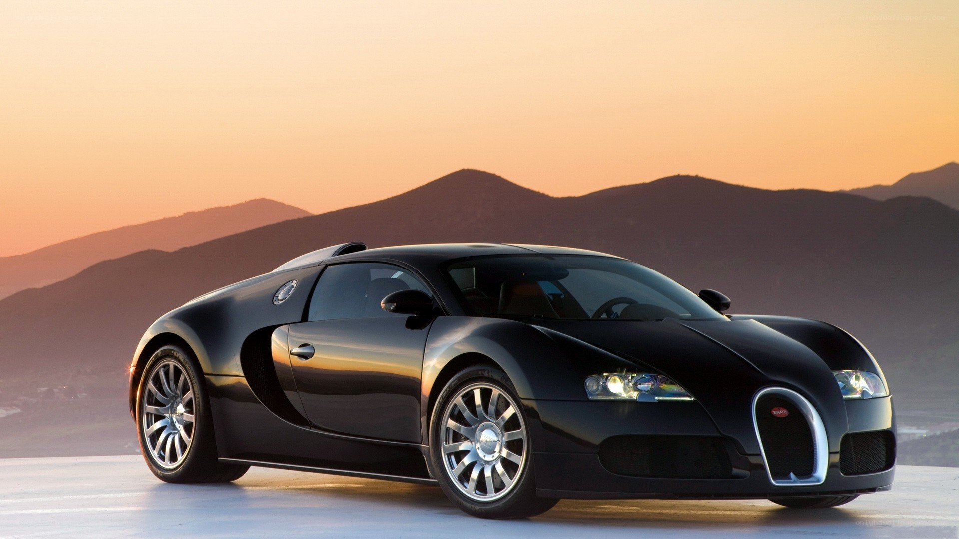 Black Bugatti Veyron at sunset
