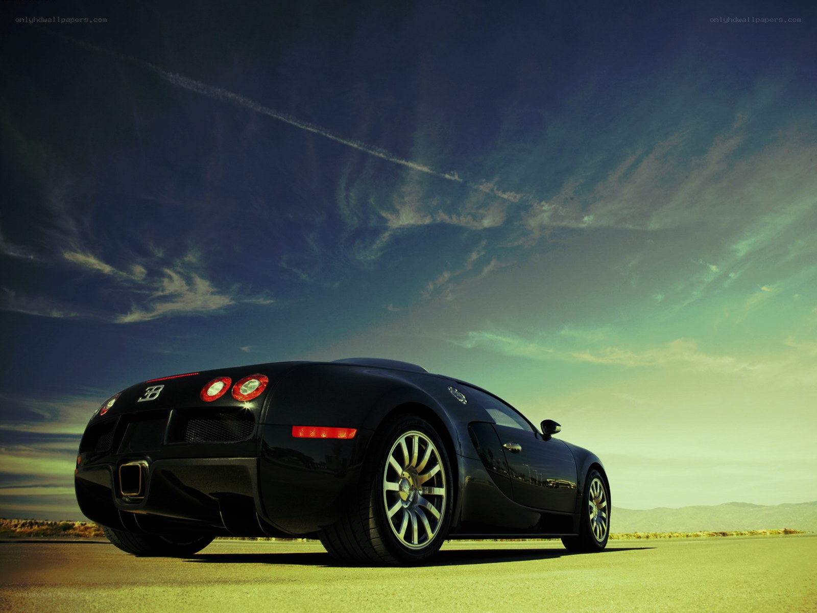 Black Bugatti Veyron at sunset