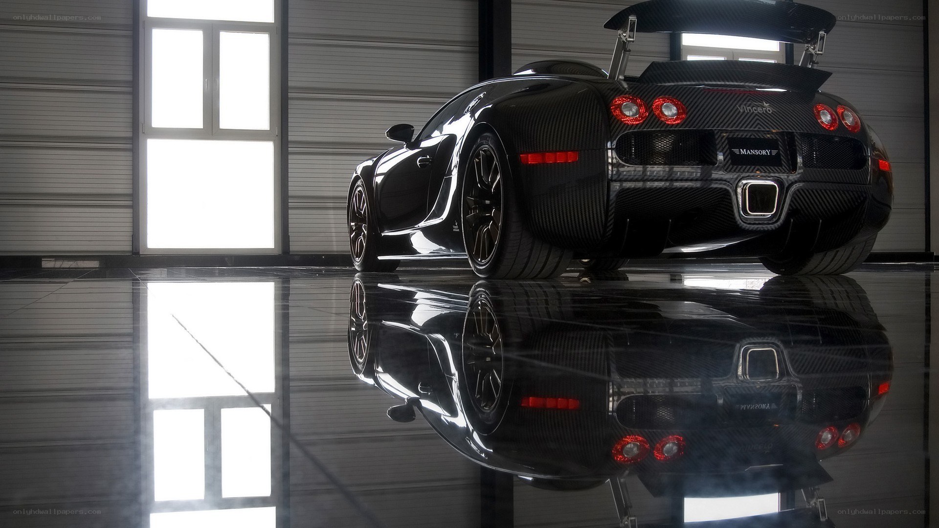 Black Bugatti Veyron in garage