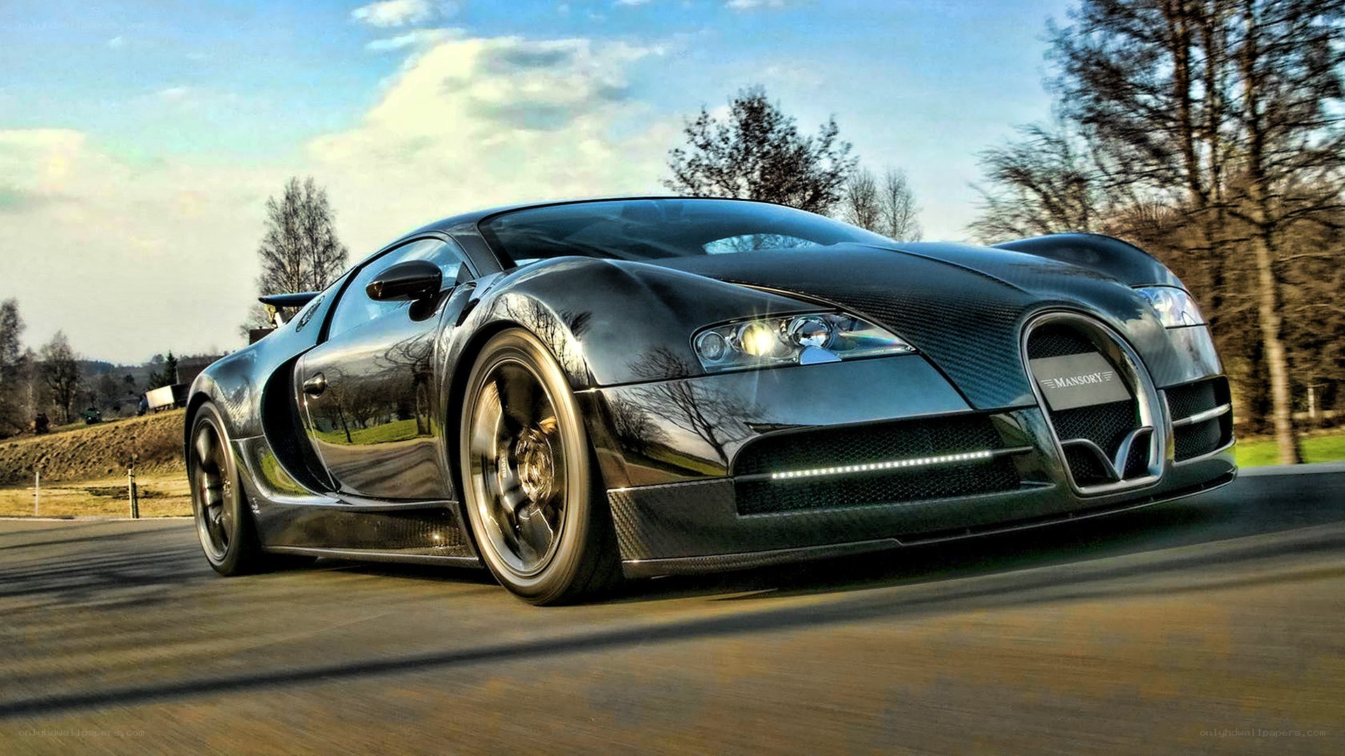 Black Bugatti Veyron in motion