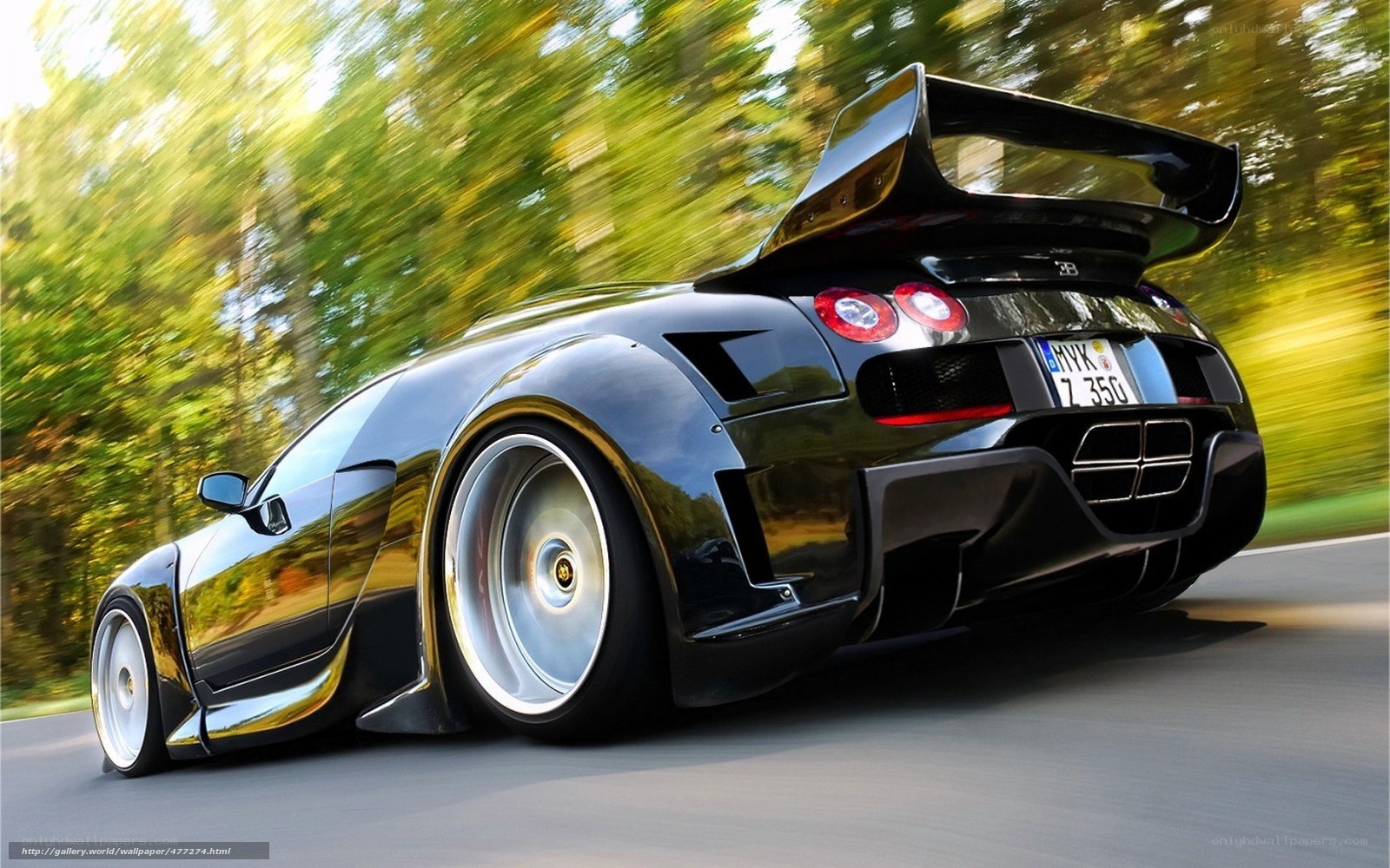 Black Bugatti Veyron in motion