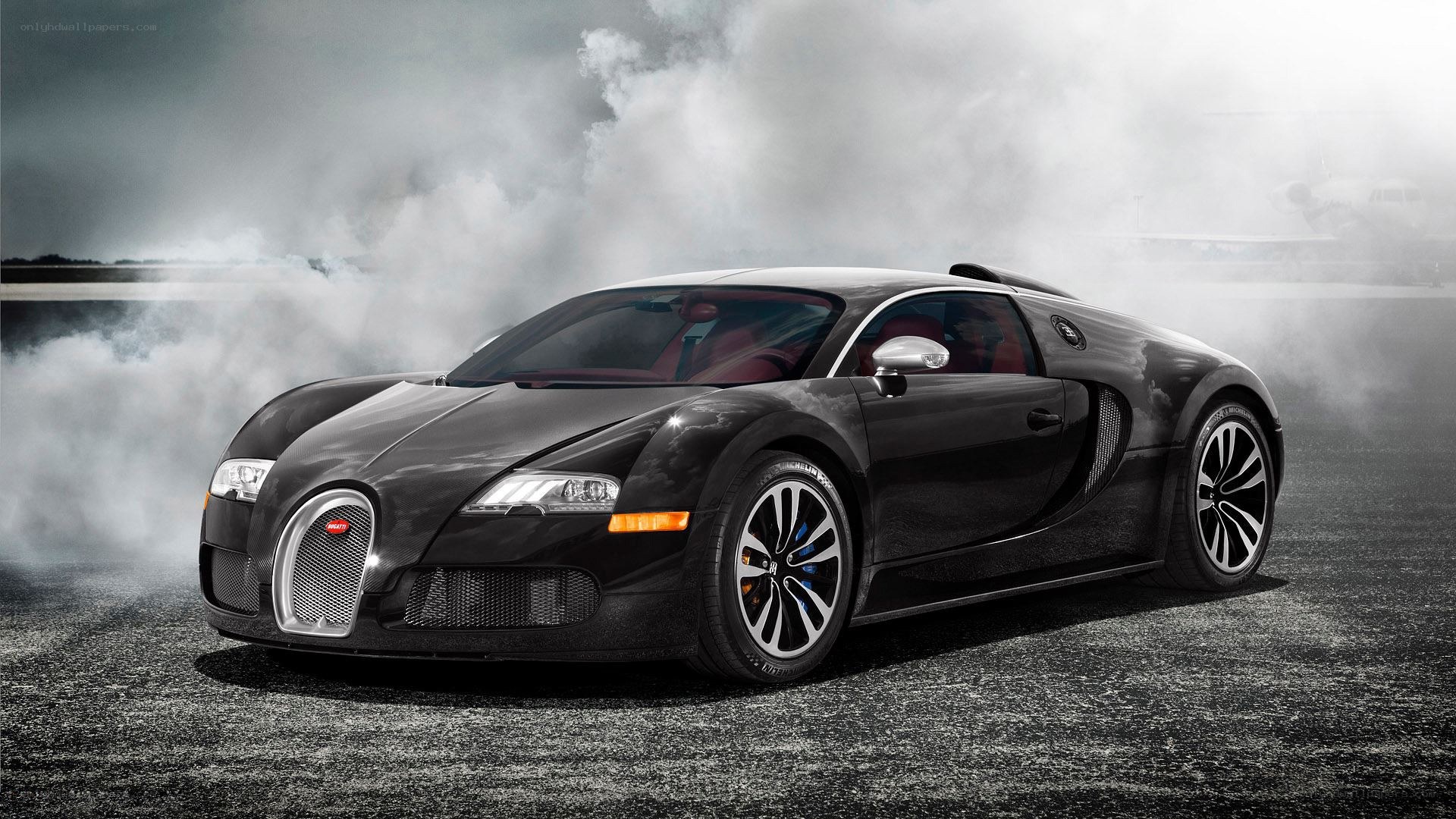 Black Bugatti Veyron in smoke
