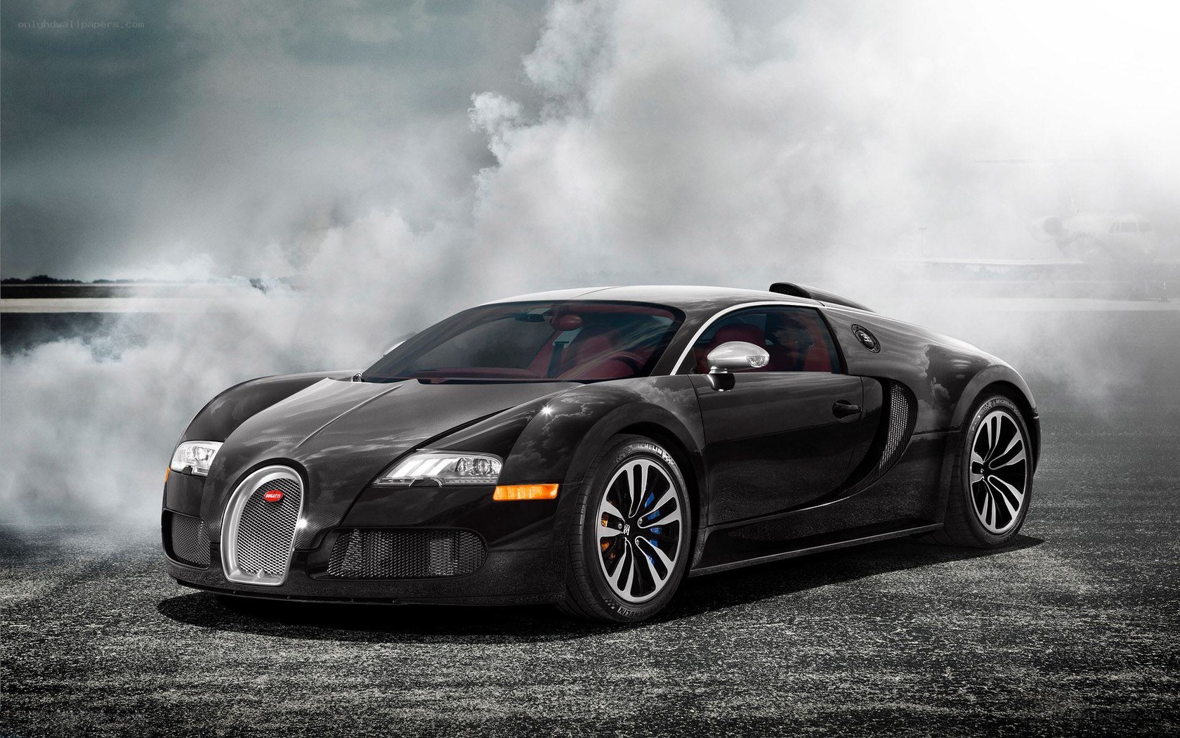 Black Bugatti Veyron in smoke