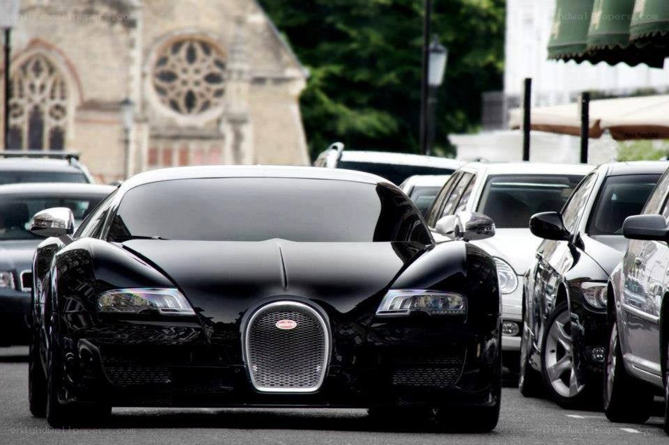 Black Bugatti Veyron on street