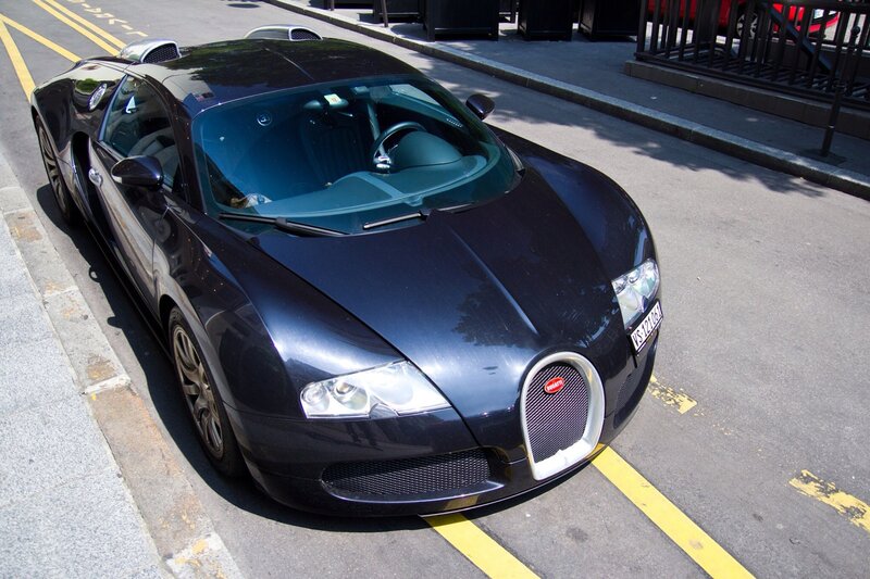 Black Bugatti Veyron parked on street
