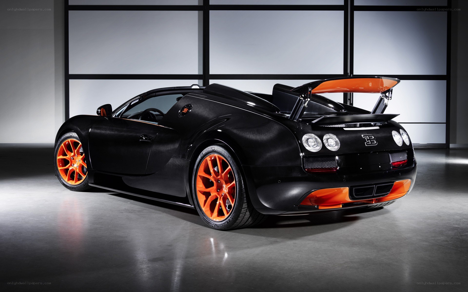 Black Bugatti Veyron with orange accents
