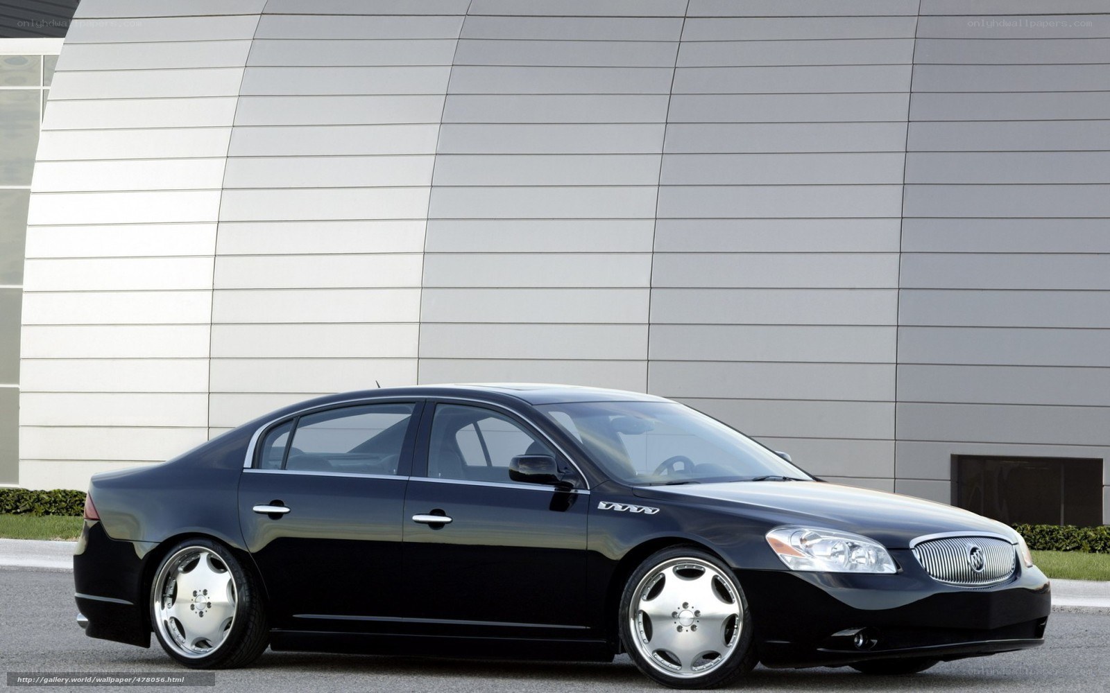 Black Buick Lucerne sedan