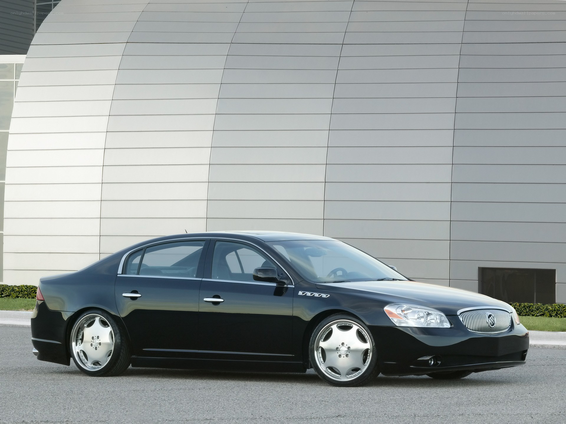 Black Buick Lucerne sedan