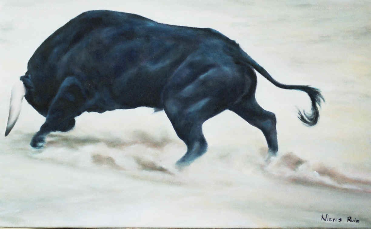 Black bull running in sand
