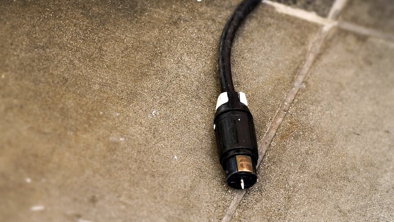 black cable on concrete