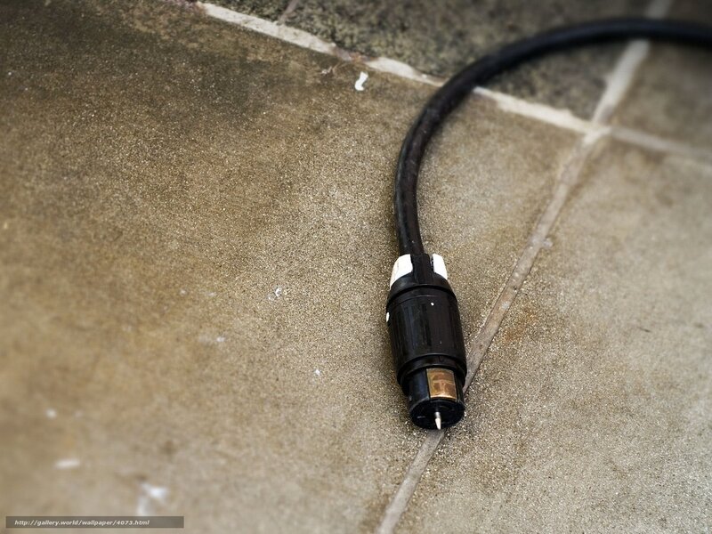 black cable on stone floor