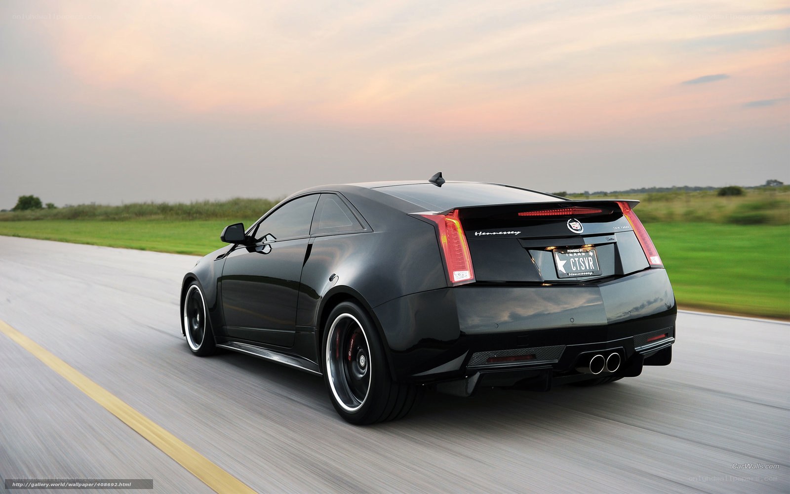 black cadillac coupe on road