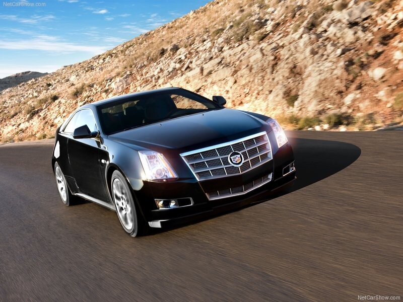 Black Cadillac CTS Coupe on a road