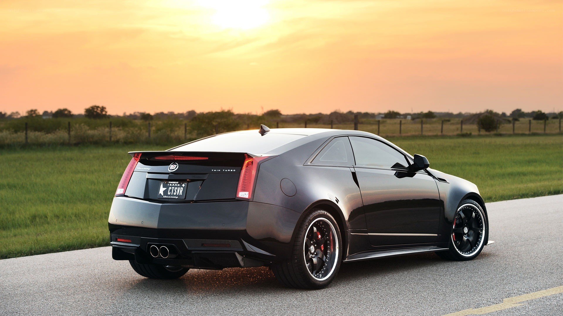 Black Cadillac CTS-V at sunset
