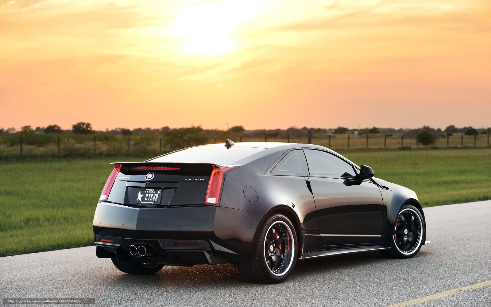 Black Cadillac CTS-V Coupe at sunset