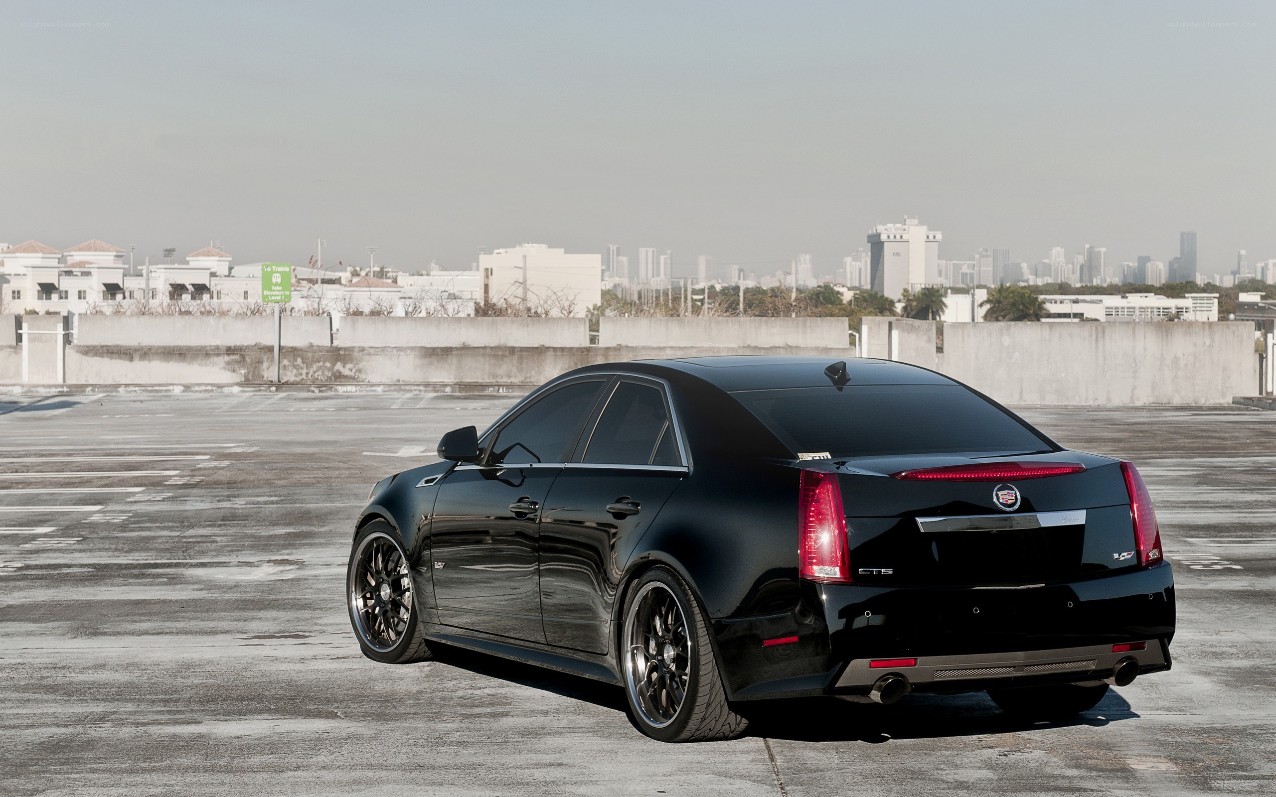 Black Cadillac CTS-V on rooftop