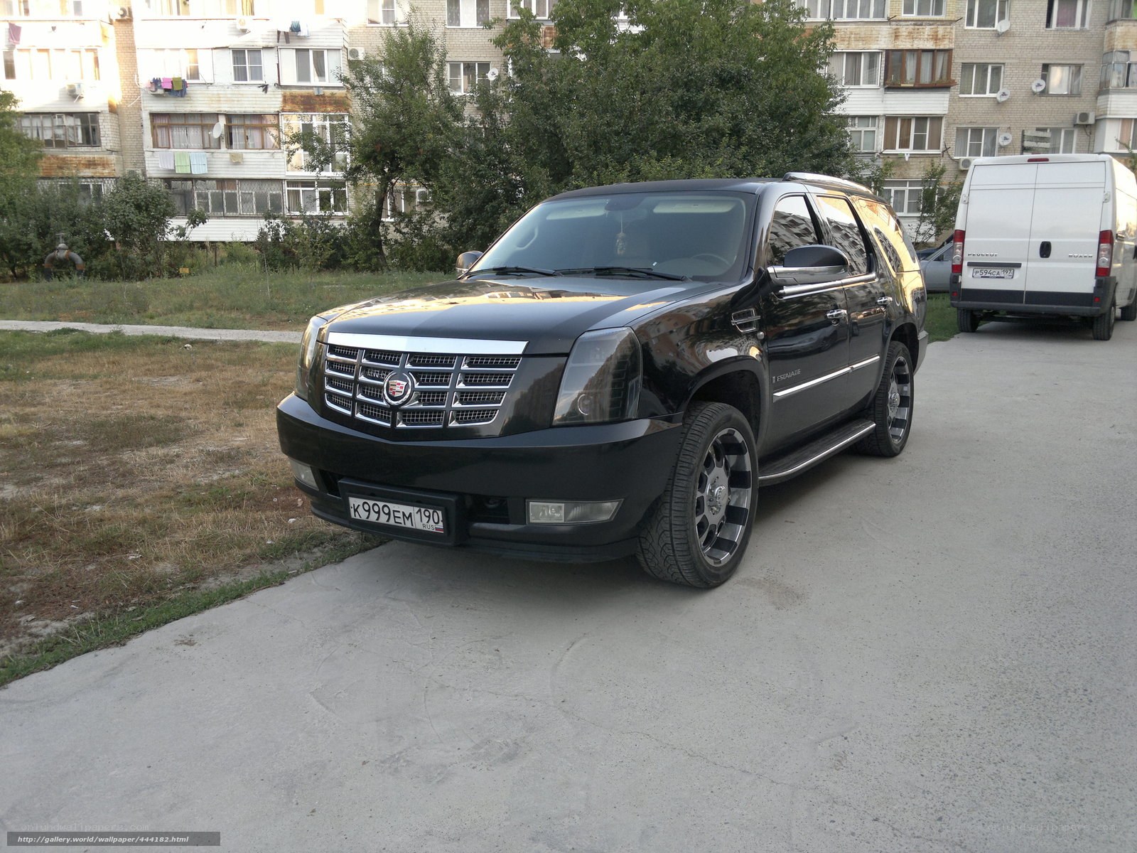 Black Cadillac Escalade parked