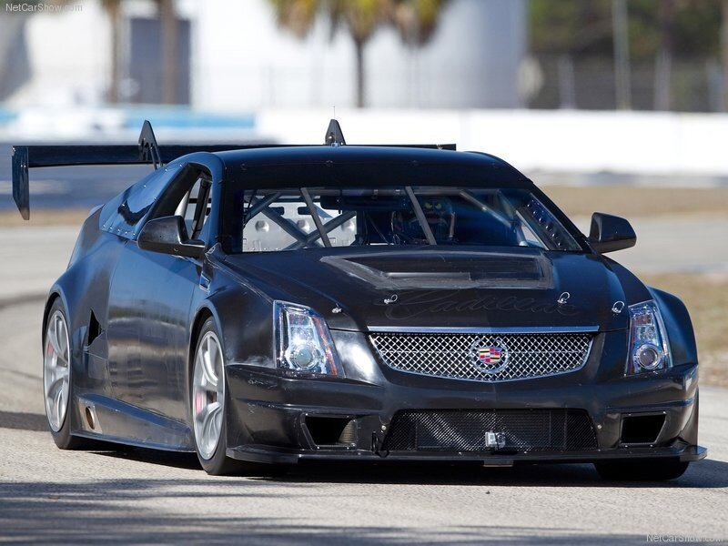 black cadillac race car on track