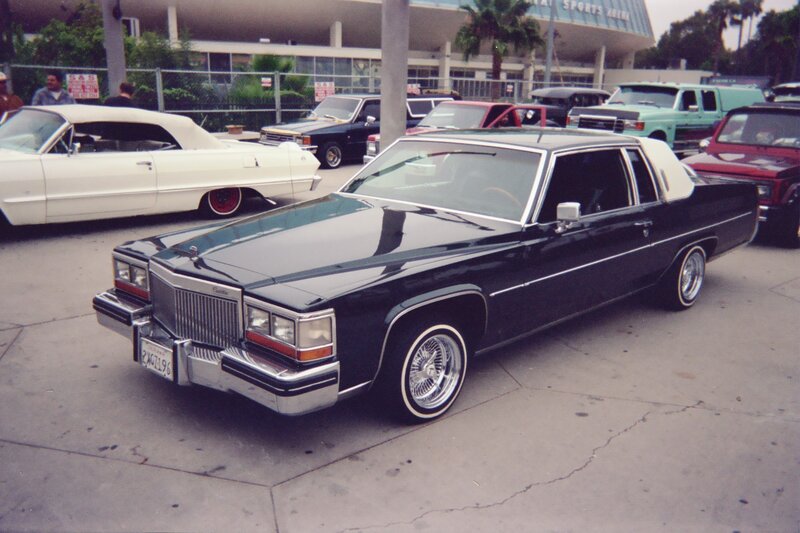Black Cadillac Sedan — Casual
