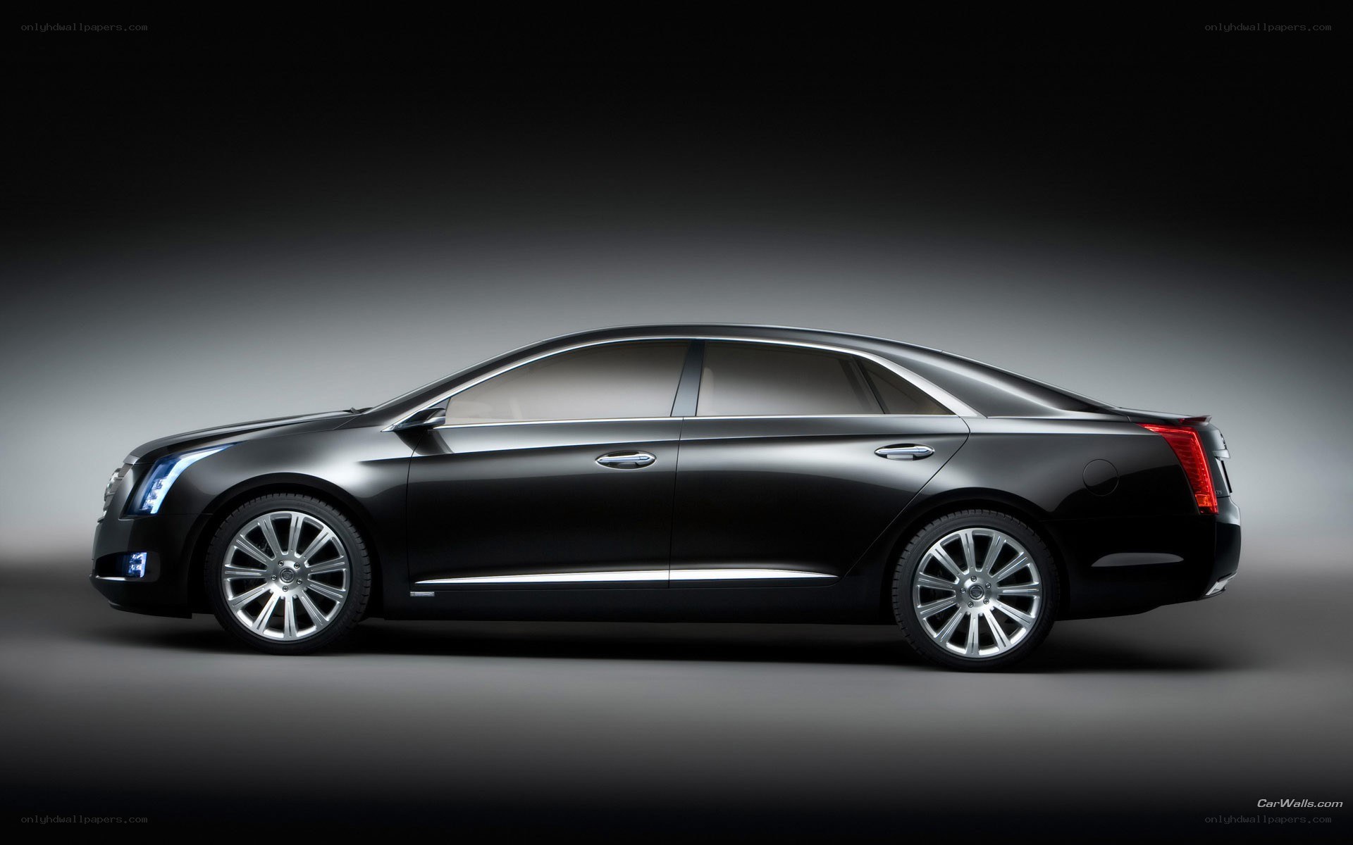 black cadillac sedan side view